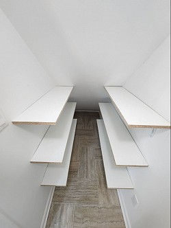 Under stairs shelving